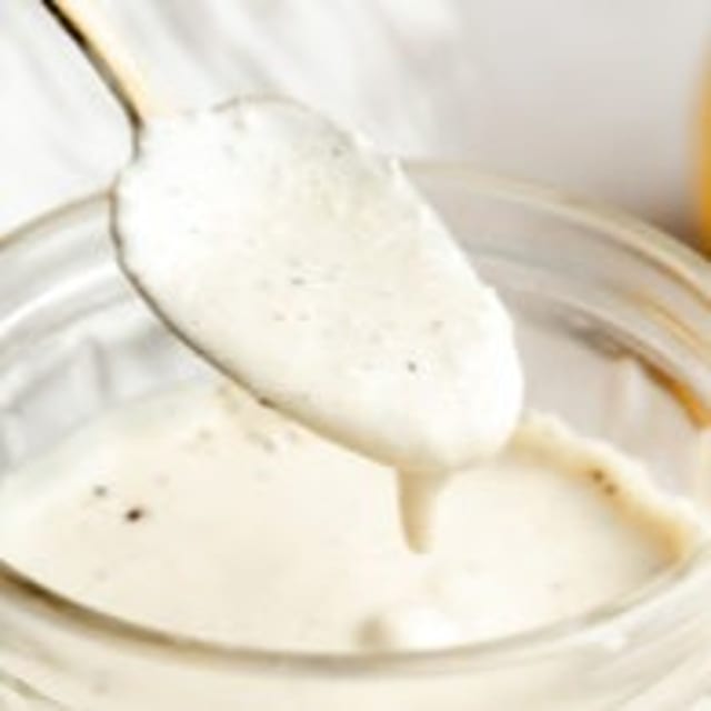 Cup of Caesar Dressing.
