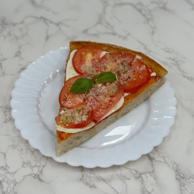 Fresh Mozzarella, Tomato, & Garlic Pan Slice.